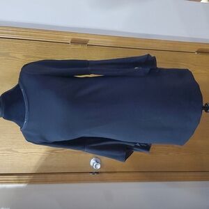 Elie tahari black flutter sleeve with raw hem neckline and a touch of bling